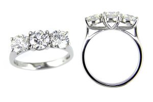 round cut diamond trilogy engagement ring style, designed & made by Faller the Jeweller, Derry/ Londonderry, Northern Ireland, bespoke cluster rings, custom design by Faller, platinum, three stone,