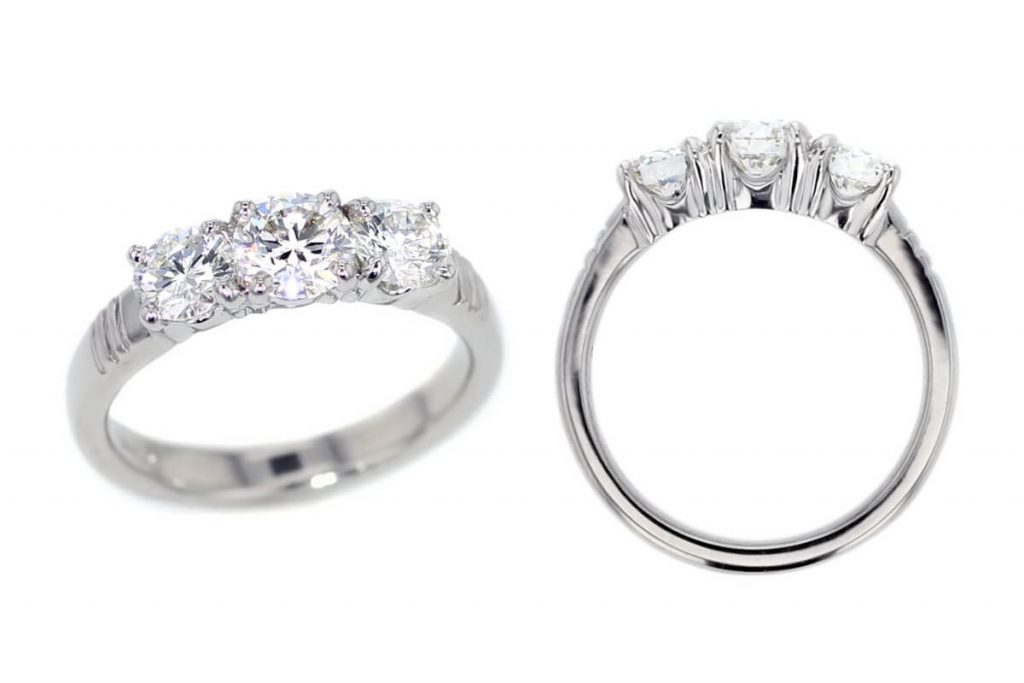 round cut diamond trilogy engagement ring style, designed & made by Faller the Jeweller, Derry/ Londonderry, Northern Ireland, bespoke cluster rings, custom design by Faller, platinum, three stone,