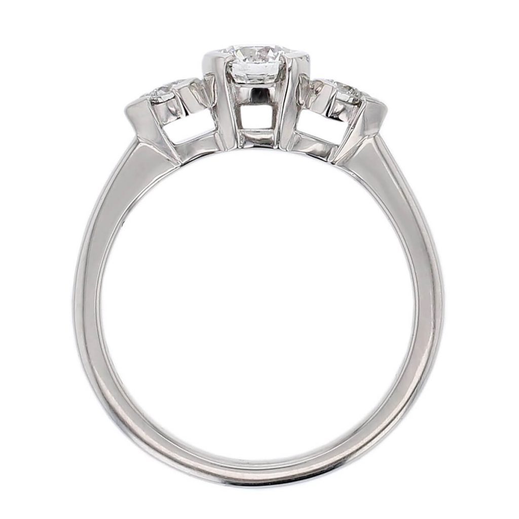 round brilliant cut diamond trilogy engagement ring, illusion pear cut side diamonds, platinum designer handmade by Faller, hand crafted, betrothal, promise, precious jewellery, jewelry, GIA certified, hand crafted, G.I.A. GIA, three stone