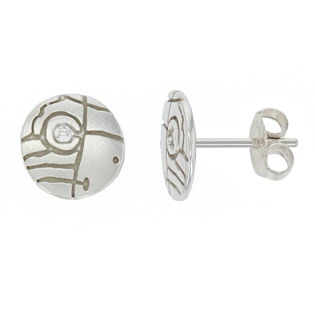 Prehistoric rock art, Isle of Doagh sterling silver disc stud earrings front and side view with post & scroll fitting.