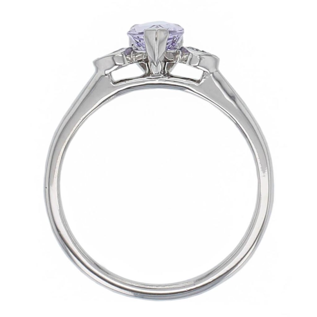 alternative engagement ring, platinum round brilliant cut diamond & pear cut purple sapphire trilogy ring designer three stone dress ring handmade by Faller, hand crafted, precious jewellery, jewelry, ladies , woman