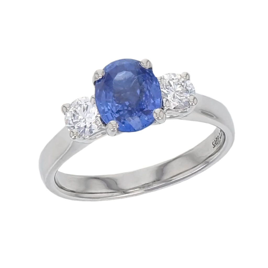alternative engagement ring, platinum, ladies ring. oval cut sapphire & diamond designer three stone engagement ring designed & hand crafted by Faller of Derry/ Londonderry, dress ring, precious gem jewellery, jewelry, trilogy, sapphire ring, blue gem ring