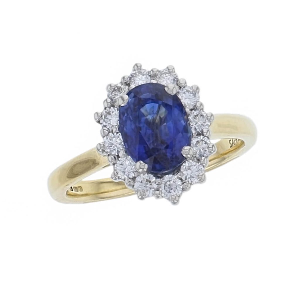 alternative engagemnt ring, 18ct yellow gold & platinum ladies oval cut royal blue sapphire & diamond designer cluster engagement ring designed & hand crafted by Faller of Derry/ Londonderry, halo dress ring, precious gem jewellery, jewelry