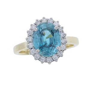 18ct yellow gold & platinum ladies oval cut blue zircon & diamond designer cluster ring designed & hand crafted by Faller of Derry/ Londonderry, halo dress ring, precious gem jewellery, jewelry