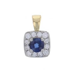 Platinum & 18ct yellow gold ladies oval cut blue sapphire & diamond halo pendant