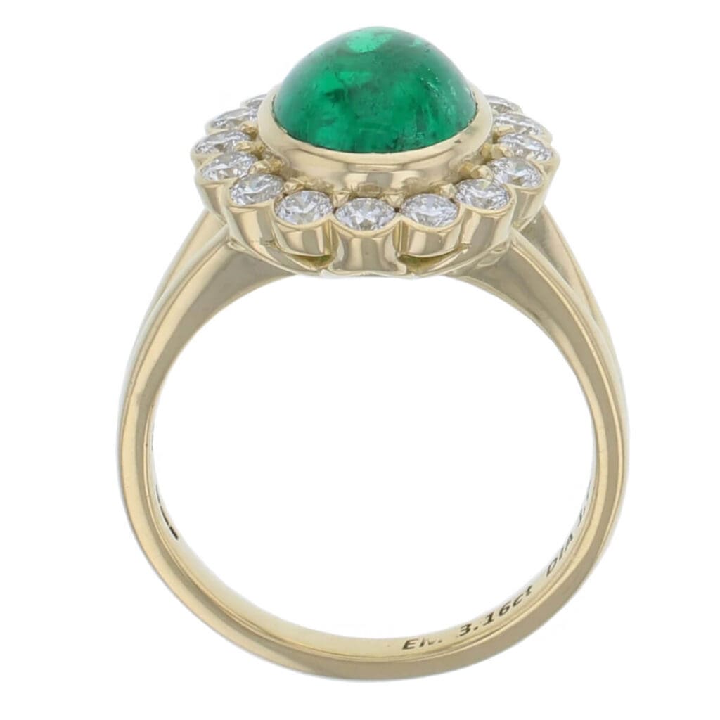 emerald, diamond 18ct yellow gold halo/cluster ring