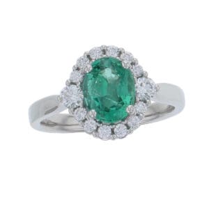 alternative engagement ring, platinum ladies oval cut emerald & diamond designer cluster/halo engagement ring designed & hand crafted by Faller of Derry/ Londonderry, cluster/halo dress ring, precious green gem jewellery