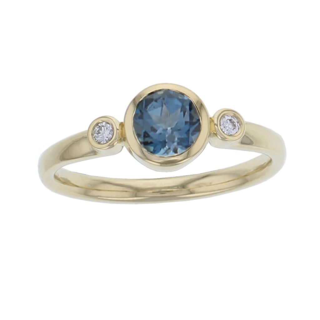 18ct yellow gold round brilliant cut diamond & round cut London blue topaz trilogy ring designer three stone dress ring handmade by Faller, hand crafted, precious jewellery, jewelry, ladies, woman