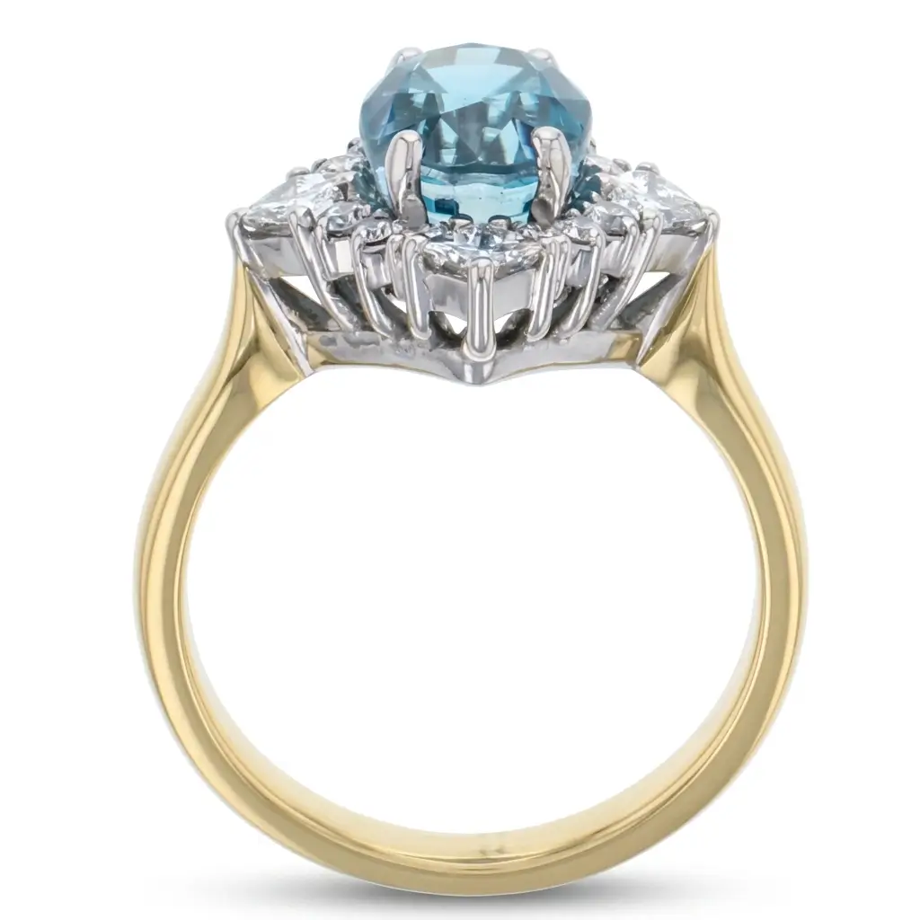 18ct yellow gold ladies oval cut blue zircon & diamond designer ring designed & hand crafted by Faller of Derry/ Londonderry, cluster/halo dress ring