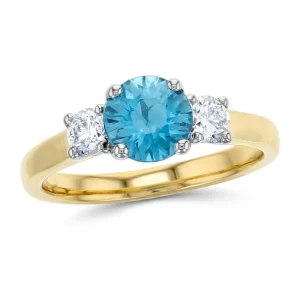 18ct yellow gold & platinum ladies round brilliant cut blue zircon & diamond designer ring designed & hand crafted by Faller of Derry/ Londonderry, trilogy dress ring